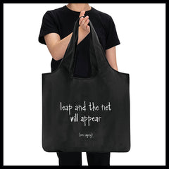 "leap and the net will appear" reusable bag